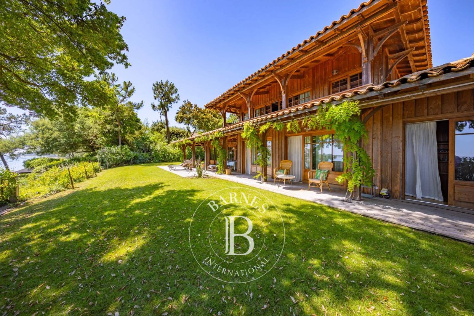 location maison familiale bois Cap Ferret avec accès direct à l’eau