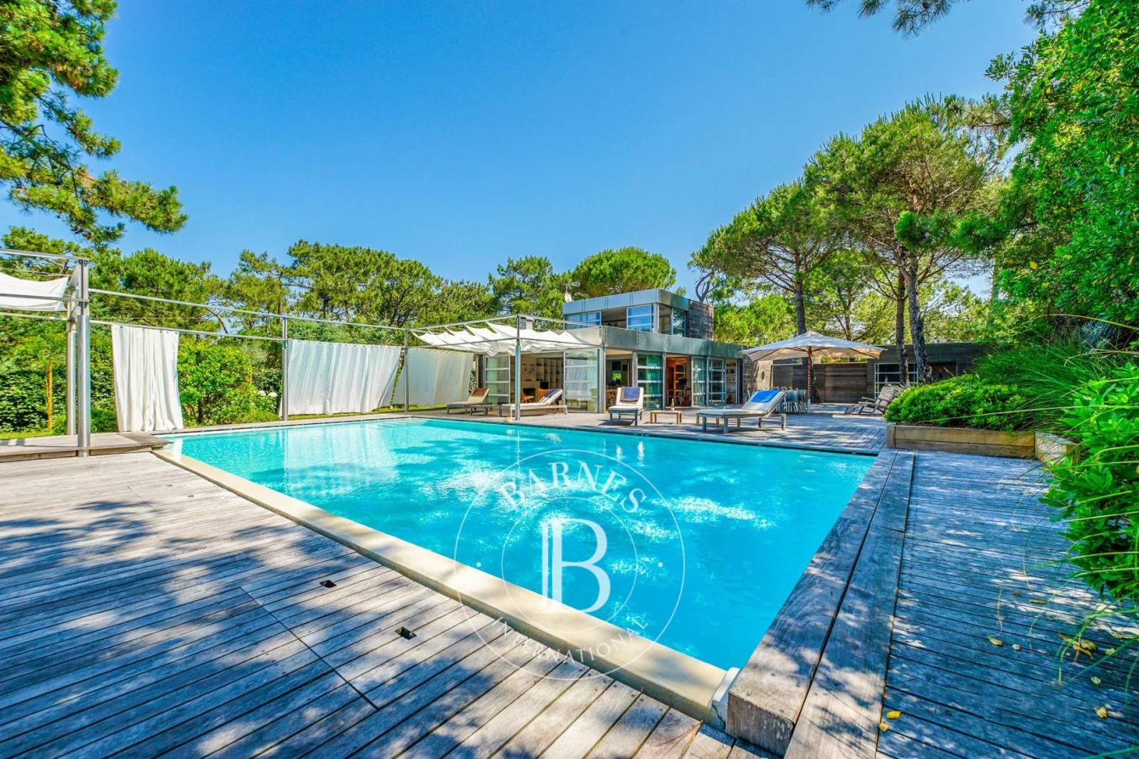 VILLA « LES PINS » AVEC PISCINE À DÉBORDEMENT, ENTRE BASSIN ET OCÉAN, AU CAP FERRET - CAPACITÉ 12 PERSONNES