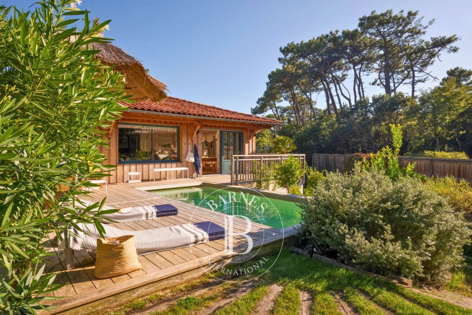 VILLA « GIOVANNA » EN BOIS AVEC PISCINE CHAUFFÉE DANS LE QUARTIER DU MIMBEAU, AU CAP FERRET – CAPACITÉ 10 PERSONNES