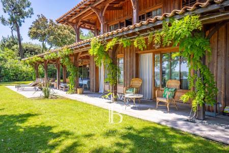 terrasse en bois avec vue panoramique sur le Bassin au Cap Ferret