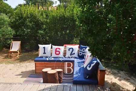Salon spacieux de 55 m² avec accès terrasse, villa de vacances au Cap Ferret