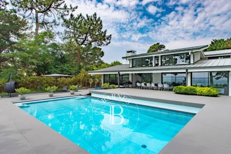 EXCEPTIONNELLE VILLA « SEIDON » EN PREMIÈRE LIGNE, AVEC VUE PANORAMIQUE BASSIN, DANS LE VILLAGE DE LA VIGNE (PRESQU’ÎLE DU CAP FERRET) - CAPACITÉ 12 PERSONNES