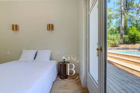 VILLA « PERLE » AVEC PISCINE CHAUFFÉE AU PORT DE LA VIGNE SUR LA PRESQU’ÎLE DU CAP FERRET – CAPACITÉ 12 PERSONNES