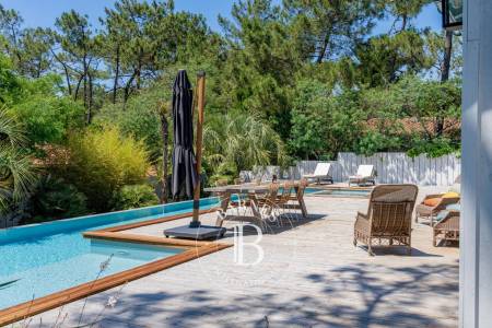 VILLA « LES COLVERTS » AVEC PISCINE À DÉBORDEMENT ET JACUZZI, À LA POINTE DU CAP FERRET - CAPACITÉ 10 PERSONNES