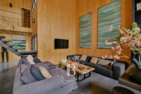 Suite principale avec accès piscine et dressing au Cap Ferret immobilier de prestige