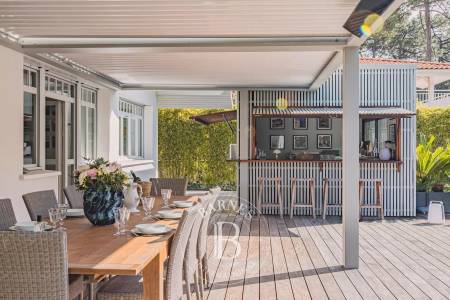 VILLA « CALYPSO » PROCHE DE LA PLAGE DES AMÉRICAINS AU CAP FERRET, AVEC PISCINE CHAUFFÉE ET CUISINE D’ÉTÉ – CAPACITÉ 12 PERSONNES