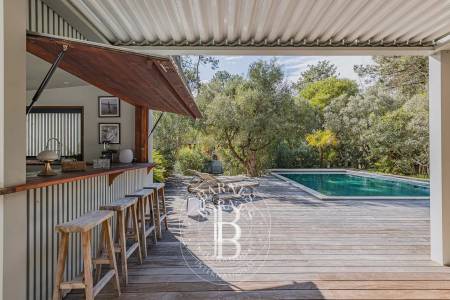 VILLA « CALYPSO » PROCHE DE LA PLAGE DES AMÉRICAINS AU CAP FERRET, AVEC PISCINE CHAUFFÉE ET CUISINE D’ÉTÉ – CAPACITÉ 12 PERSONNES